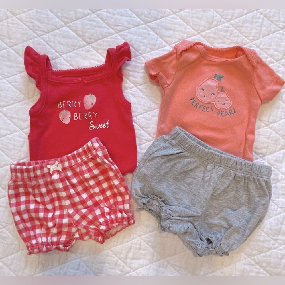 2 Carter’s Newborn Outfits
